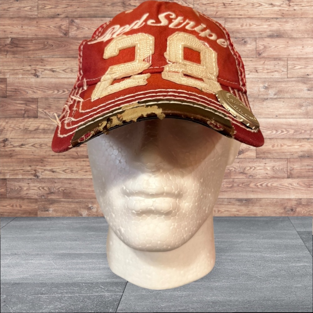 Red Stripe hat from Jamaica with bottle opener in the inside of the bill..